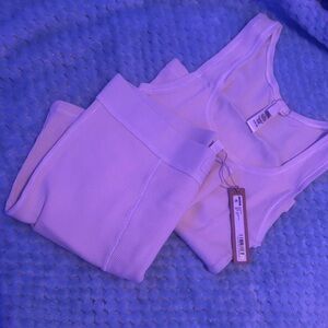 SKIMS cream tank & shorts